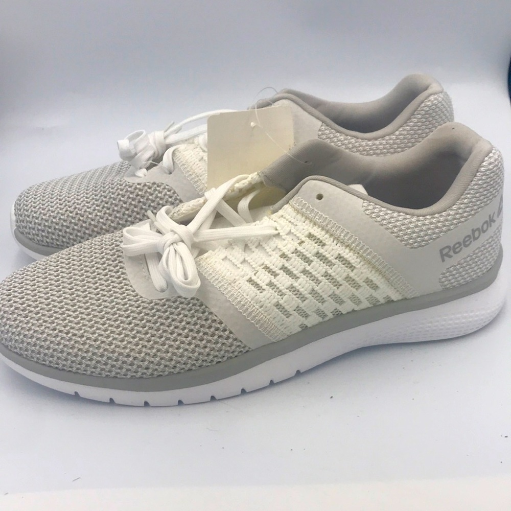 Ladies Reebok White Sneakers New with tag. Size 9